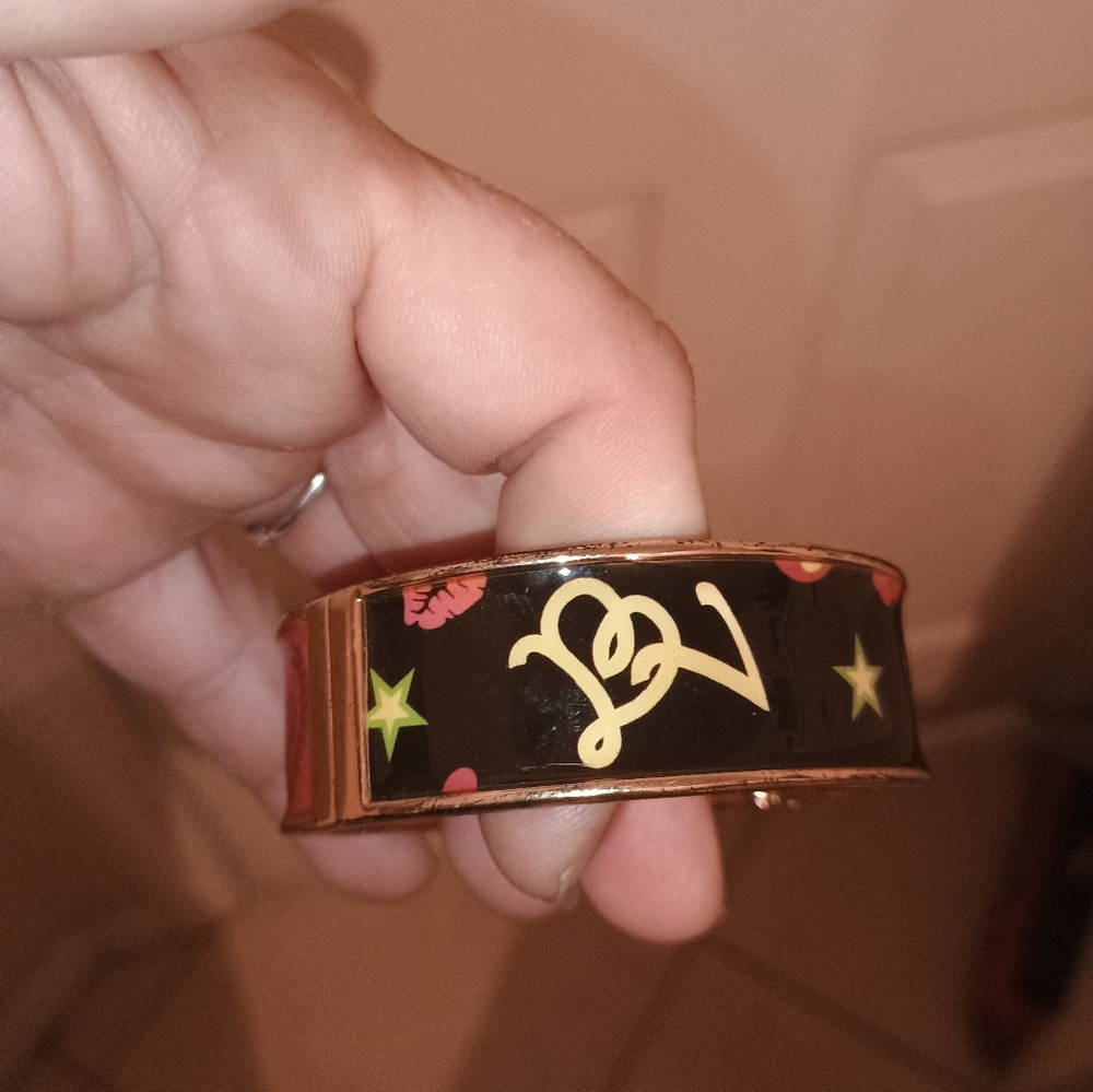 Vintage Betseyville by Betsey Johnson gold tone cuff hinge bracelet